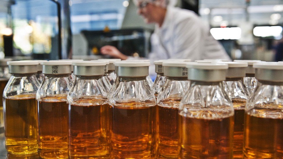 Bottles with blood plasma derivatives stand on a packing plant at the Octapharma company in Dessau, eastern Germany.