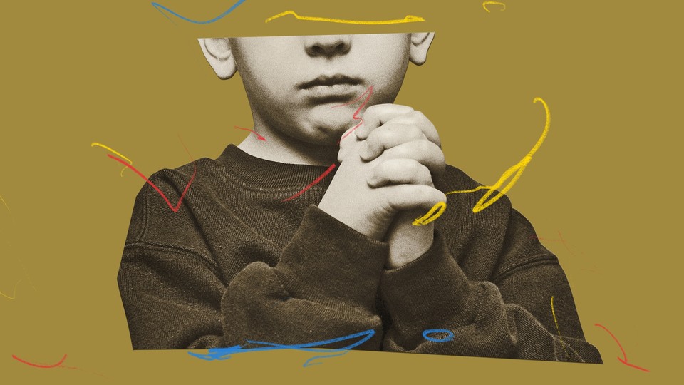 A young boy praying