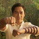Tony Leung wearing the 10 rings in a bamboo forest