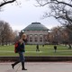 Students walk across the campus of the University of Illinois at Urbana-Champaign.