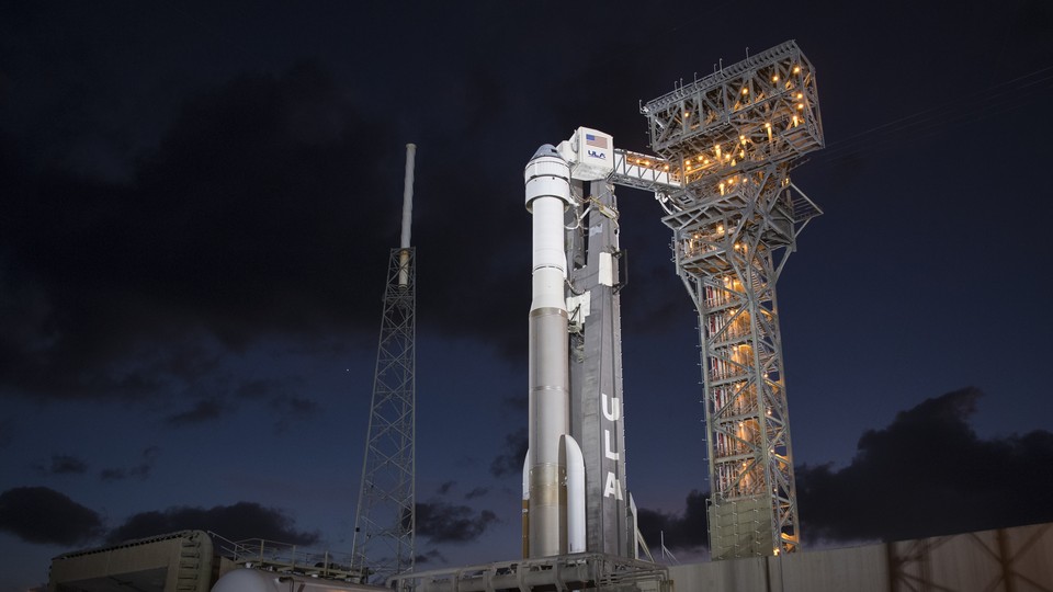 A Boeing capsule atop an Atlas V rocket prepares to launch from Cape Canaveral.