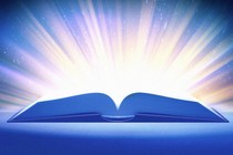 An open book radiating light