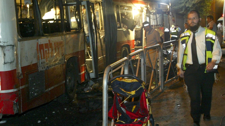 The aftermath of a 2003 Hamas bus bombing in Jerusalem, in which 20 people were killed