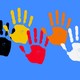 An illustration of different-colored handprints