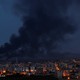 Smoke rises over the Syrian town of Ras al-Ain.