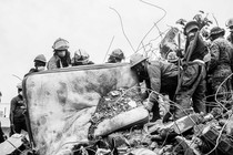 Firefighters in Haiti remove debris as they search for survivors of the August 14 earthquake.