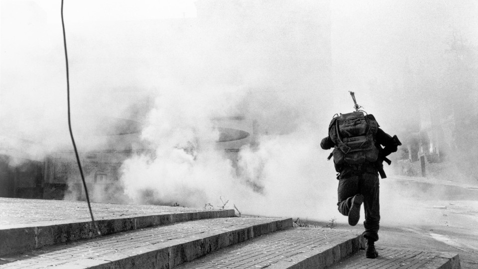Israeli soldier breaking into West Beirut in September 1982