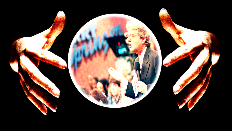 Two hands hover over a crystal ball with "The Jerry Springer Show" playing inside it