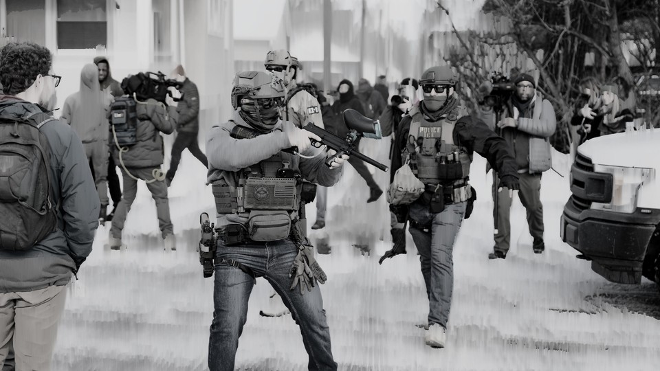 Black-and-white picture of heavily armed police officers in the street