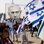 Protesters waving Israeli flags