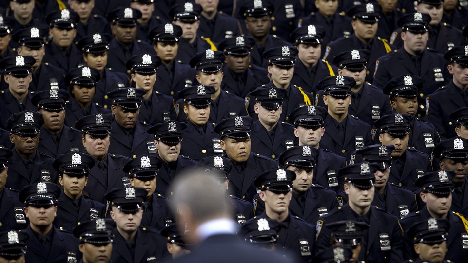 Dozens of police officers in uniform 
