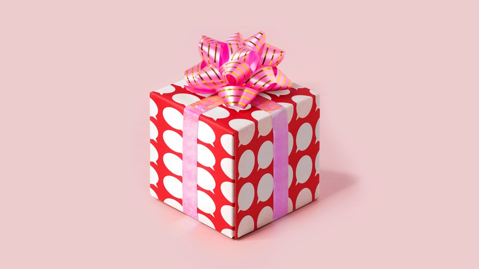A gift wrapped with decorative paper and a bow