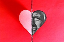 An illustration of a paper heart with Donald Trump's face filling in half of the heart icon