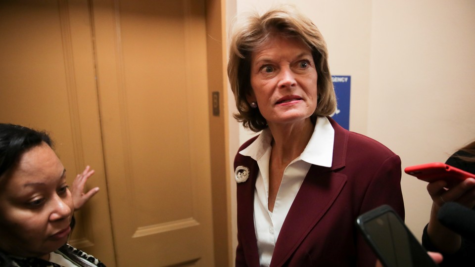 Senator Lisa Murkowski talking to reporters