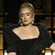 Adele in a black gown