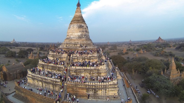 People wait to see the sunset from atop the Shwesandaw Pagoda in Bagan, Myanmar, on February 13, 2015.