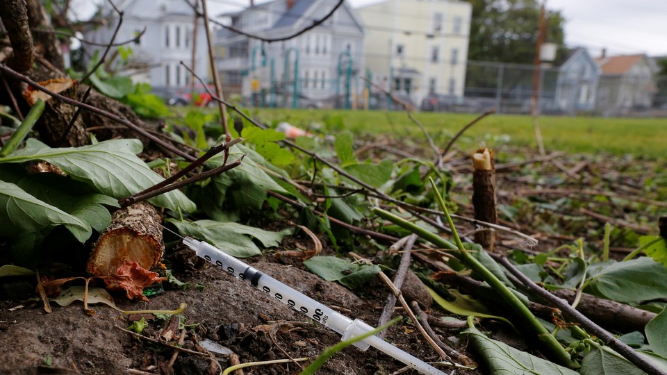 A syringe on the ground