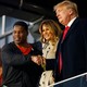 Herschel Walker shaking hands with Donald Trump