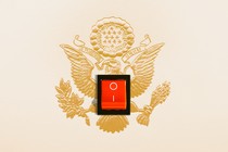 The U.S. seal with an on-off switch in its center