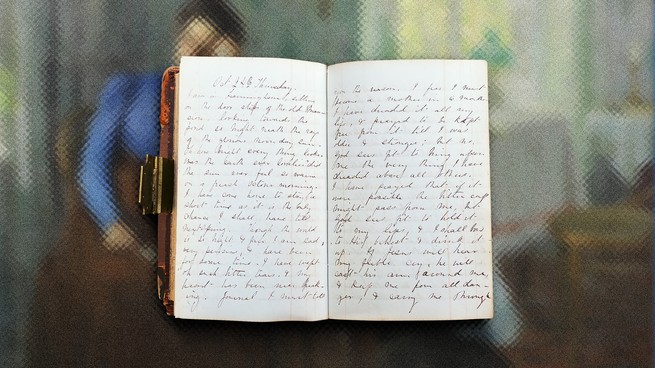A photograph of an old diary with cursive writing on top of a blurred photo of a woman sitting in a house