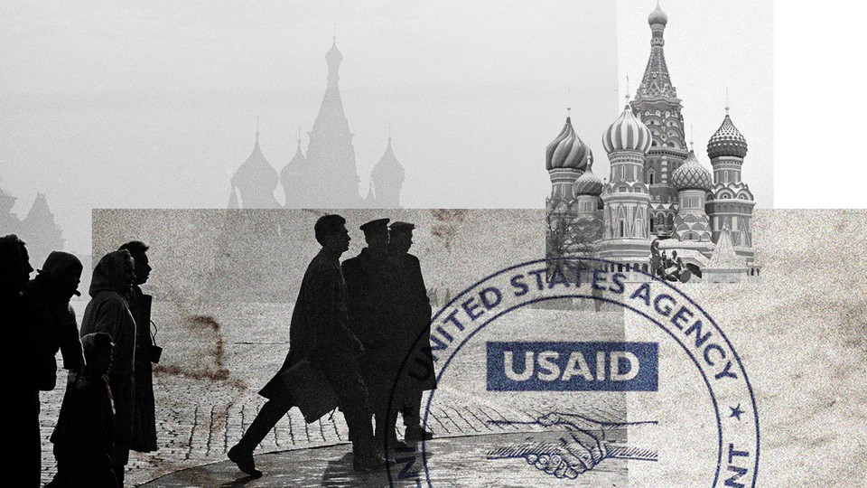 A photo-illustration that shows the Kremlin and a USAID stamp