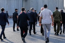 Antony Blinken walks with Israeli Defense Minister Yoav Gallant toward the Gaza border at the Kerem Shalom crossing