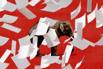 An elephant on a red background, partly obscured by flying pieces of paper
