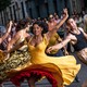 A group of dancers performing in the street in Steven Spielberg's "West Side Story"