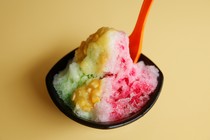 A small bowl of colorful shaved ice