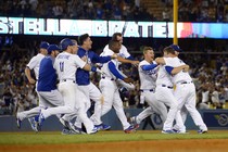 The Dodgers celebrate a win against the San Francisco Giants.