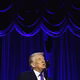 A photograph of Donald Trump speaking at the National Prayer Breakfast