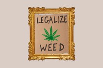 A "Legalize Weed" sign inside a golden frame