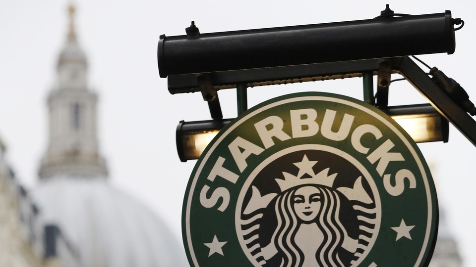 A Starbucks coffee sign near St. Paul's Cathedral in London