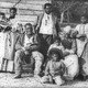 An old photograph of a family of enslaved people on Smith's Plantation
