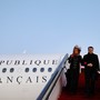 President Emmanuel Macron and his wife Brigitte Macron arrive at Beijing Capital Airport.