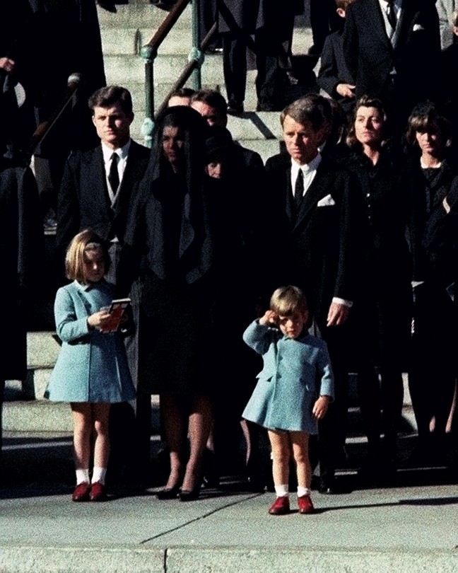 Three-year-old John Kennedy Jr. salutes his father's casket as it leaves the Cathedral of St. Matthew the Apostle in Washington, D.C., en route to Arlington National Cemetery.