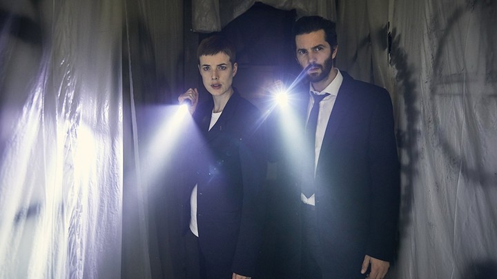 Agyness Deyn and Jim Sturgess with flashlights in a still from 'Hard Sun'