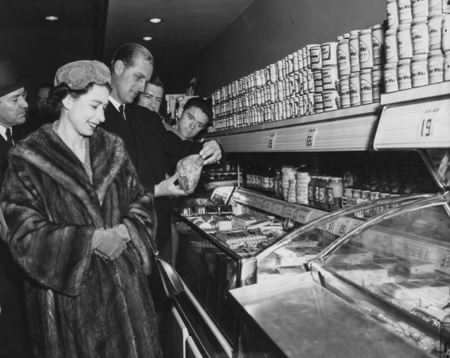 black and white 1957 photo of Queen Elizabeth at supermarket