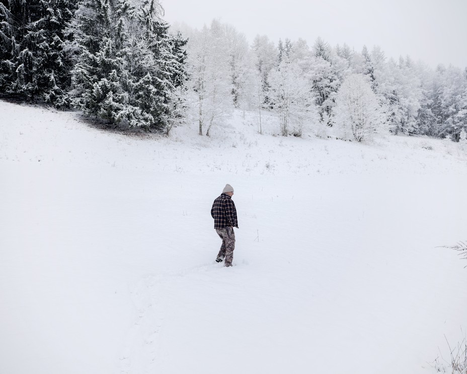 Picture of Hervé walking in the mountain