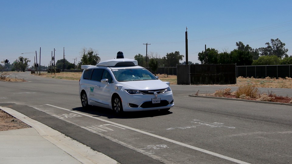 A self-driving Waymo vehicle at the company's test city on the former Castle Air Force Base