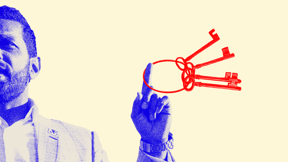 Kash Patel holding a set of keys