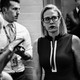 Senator Kyrsten Sinema walks down a hallway