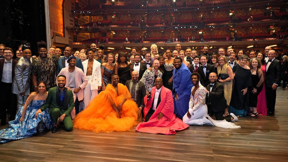Barbara Whitman, Michael R. Jackson, Jaquel Spivey, and "A Strange Loop" cast and crew pose onstage 