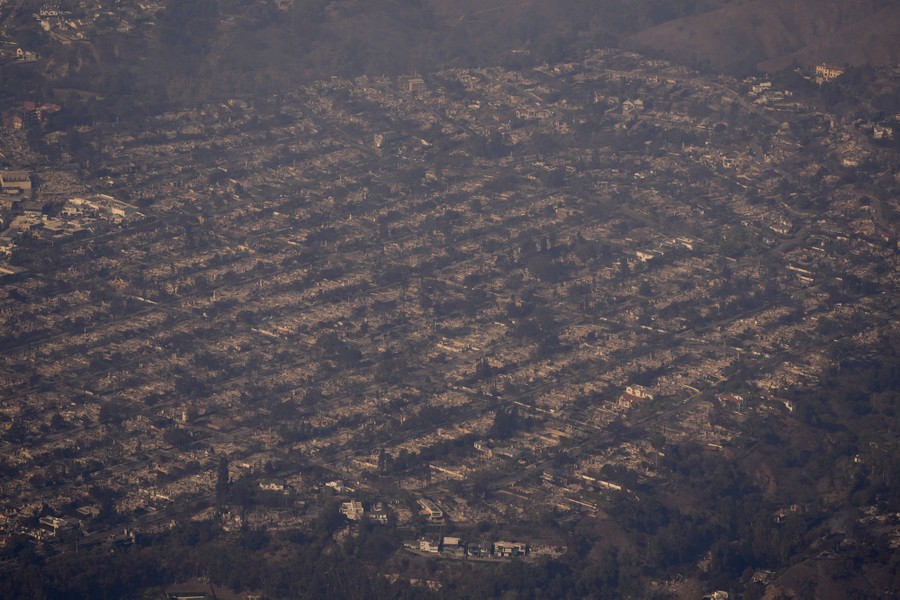 An aerial view of an entire neighborhood of fire-destroyed homes