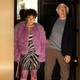 Larry David and Susie Essman stand in a doorway