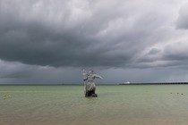 A sculpture of Poseidon stands in the ocean before the arrival of Hurricane Milton in Progreso, Yucatan state, Mexico.