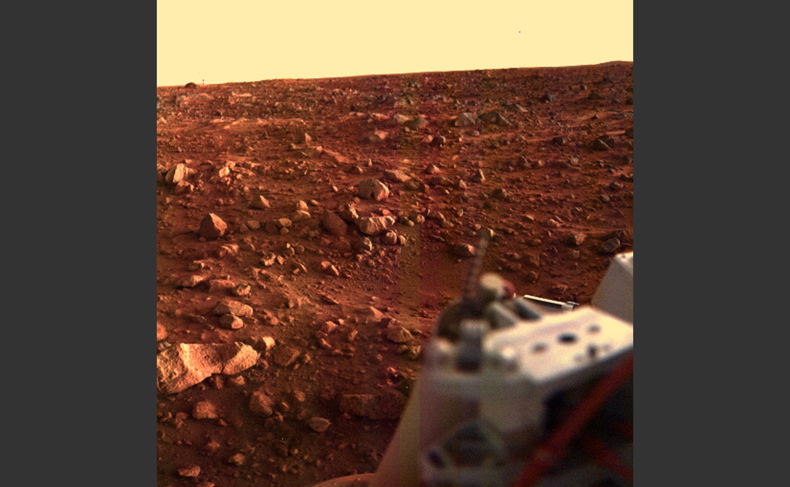 A color image of the surface of Mars at sunset