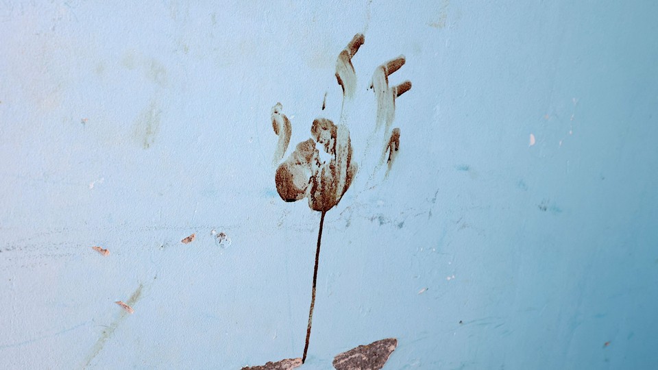 A bloody handprint in an Israeli kibbutz