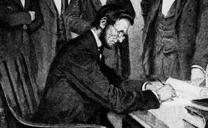 President Lincoln signs the Emancipation Proclamation