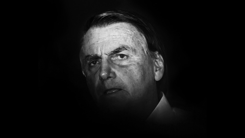 A black-and-white photo portrait of Jair Bolsonaro